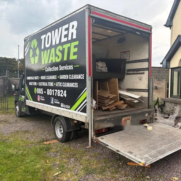 The Tower Waste van on a house clear-out, tail lift down