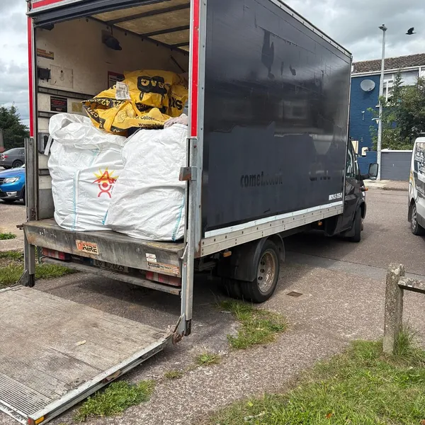 Bulk bags loaded on the van's tail lift
