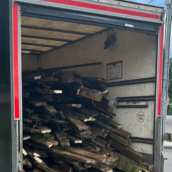 Old timber planks loaded in the van