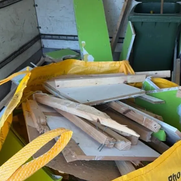A Skippo skip bag full of old timber