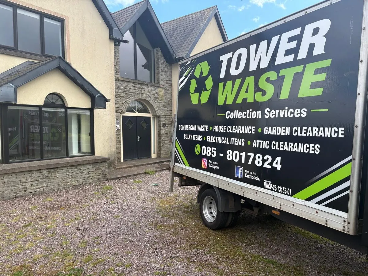 The Tower Waste van, sign-written, parked at a house